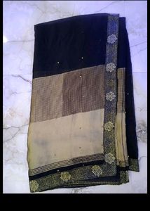pretty olive black saree.