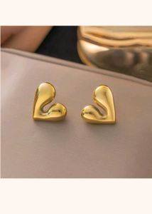 Gold Heart Statement Earrings