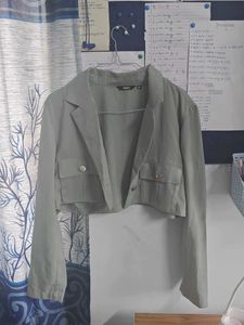 sage green miniskirt and blazer co ord set