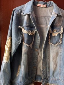 ripped denim jacket with sequins
