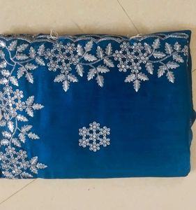 beautiful silver work blue saree and contrast red