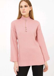 Pink Knit Top with blue denim jeans