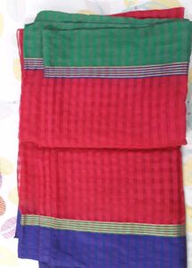 Red colour saree with multi coloured boarders,  fe