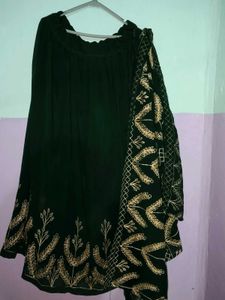 A Dark Green Coloured Lehenga,100% qualified,