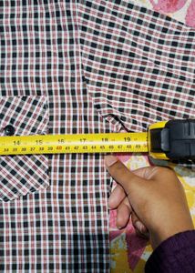 Stylish women’s checkered shirt