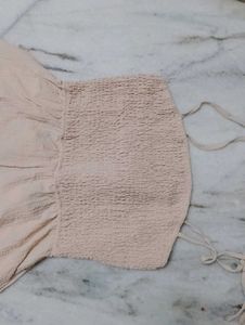 Beige Romper with Ruffle Detail