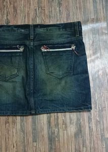 Dark wash denim mini skirt