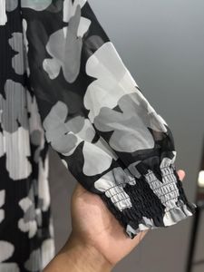 Black And White Knee Length Top