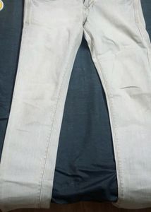 Light Silver Coloured Jeans. Unused