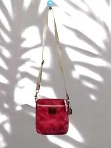 Authentic Coach Sling