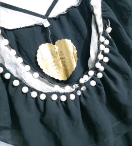 Black Sheer Ruffled Top with Keyhole Neckline
