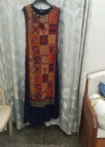 Heavy long gown for women...Unused.