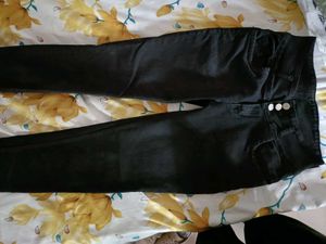 It Is Black Jeans With Tag And Solid  Colour