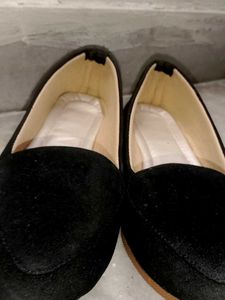 Black velvet slip-on loafers