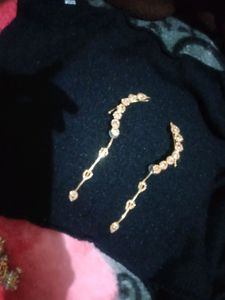 pretty golden color earrings . good looking for party wear outfits.