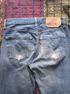 Worn Blue Denim Jeans