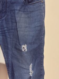 Ripped Blue Denim Jeans