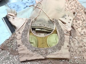 Peach Embroidered Lehenga Choli