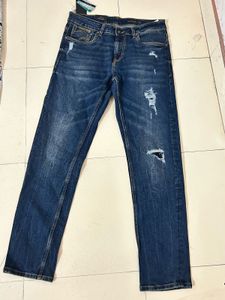 Distressed Denim Jeans