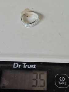 Pure silver ring in white zircon.