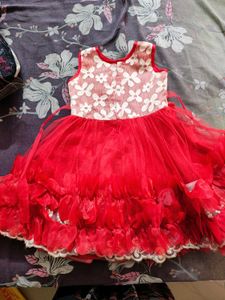 Red Frock With White Detailing
