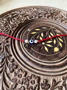 Initial Rakhi