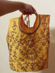 Embroidered Yellow Blouse And Lehenga