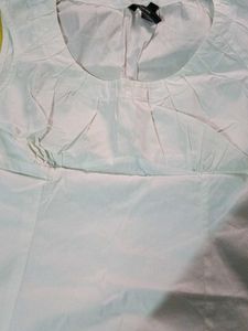 White Sleeveless Top