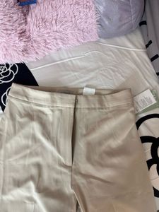 Beige Wide Leg Trousers new with tags