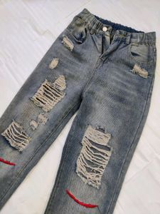 Women High-Rise Heavily Washed Distressed Jean