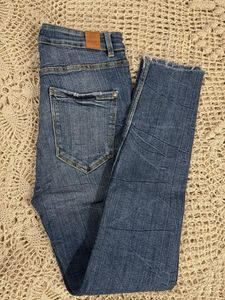 Ripped Knee Denim Jeans