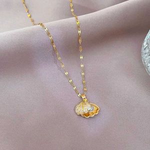 Beautiful stainless Steel golden shell necklace.