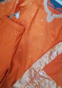 Orange Embroidered Kurta Set.   cash only