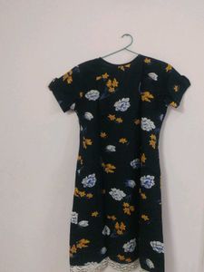 I am selling a black cotton mini dress.
