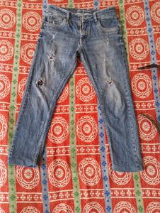 Distressed Denim Jeans