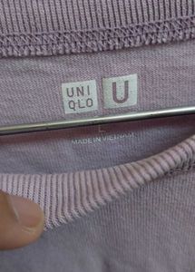 Uniqlo Solid Women Round Purple T Shirt