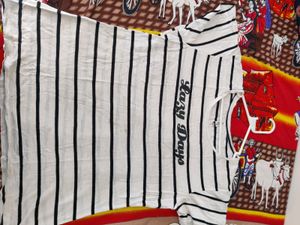 Woman&#39;s White Top With Black Strips