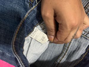 Ripped Blue Denim Jeans
