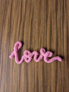 Pink Knitted 'Love' Sign
