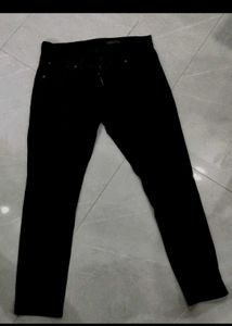 A Black Spykar Denim Jeans