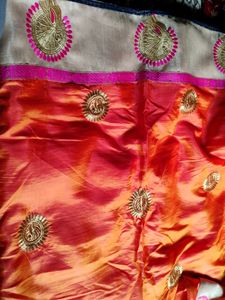 Elegant Orange Embroidered Saree