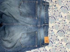 Ripped High-Waisted Jeans