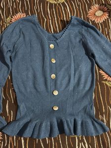Blue long sleeve knit top