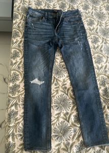 Distressed Denim Jeans
