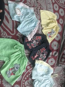 Combo Of Kids Shorts  Till 18 Months You Can Use  Only Green One Has Small  Stain  That To  Other Dress  Color  Sticked To This One  And  All  Elastics Are Good In  Condition Hardly Used  4 To 5Times