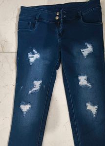 Ripped Blue Denim Jeans