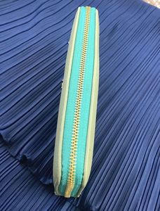 Mint Green Zipper Wallet – Stylish, Compact &amp; New