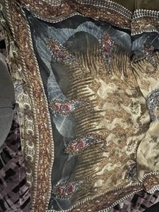 beautiful printed saree with beads work