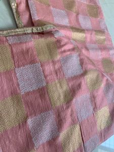 Pink saree with beautiful white and golden design