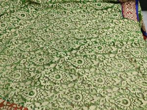 GREEN SAREE WITH RED BORDER